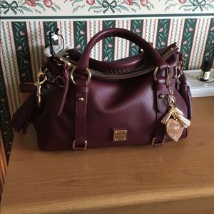 Dooney and Bourke in rare color Bordeaux. EUC, carried once. Moving must sell😢